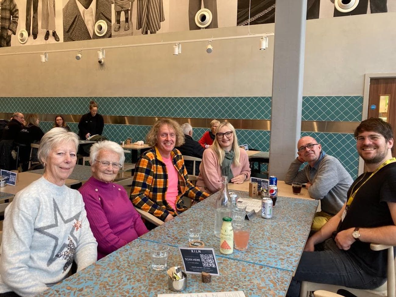 Grayson Perry (check jacket) lunches with Margaret and Tricia.