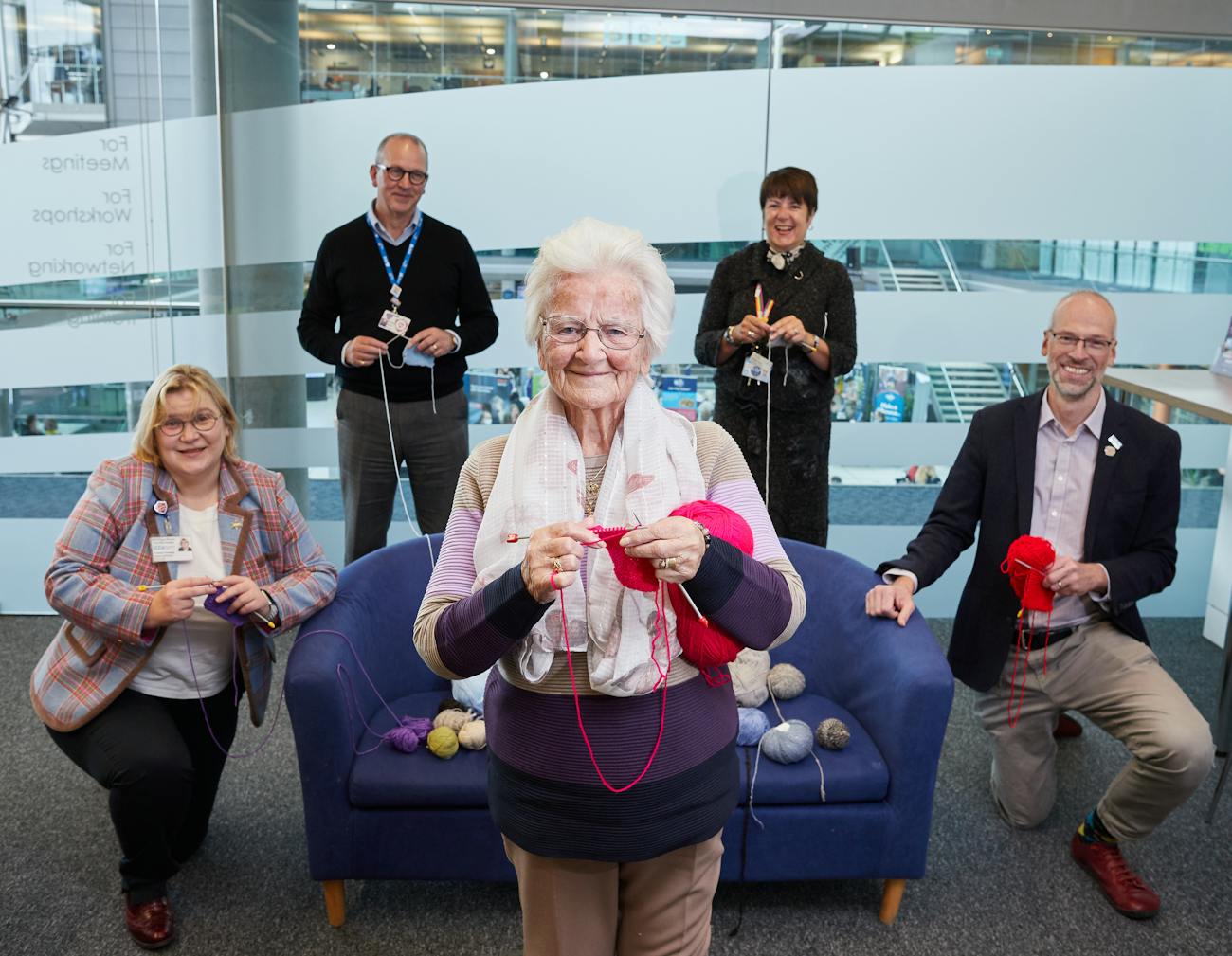 Margaret teaching managers from Norfolk's hospitals how to knit!